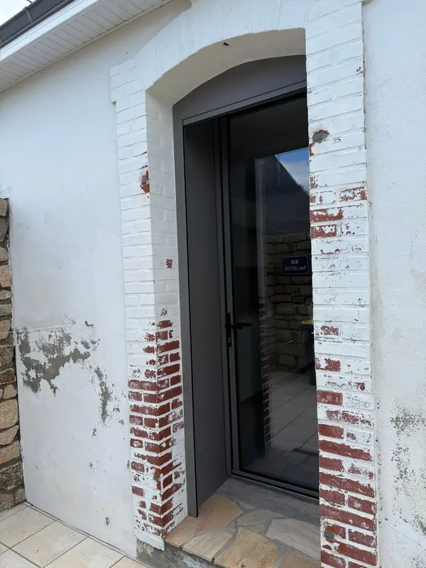 Porte vitrée aluminium en rénovation