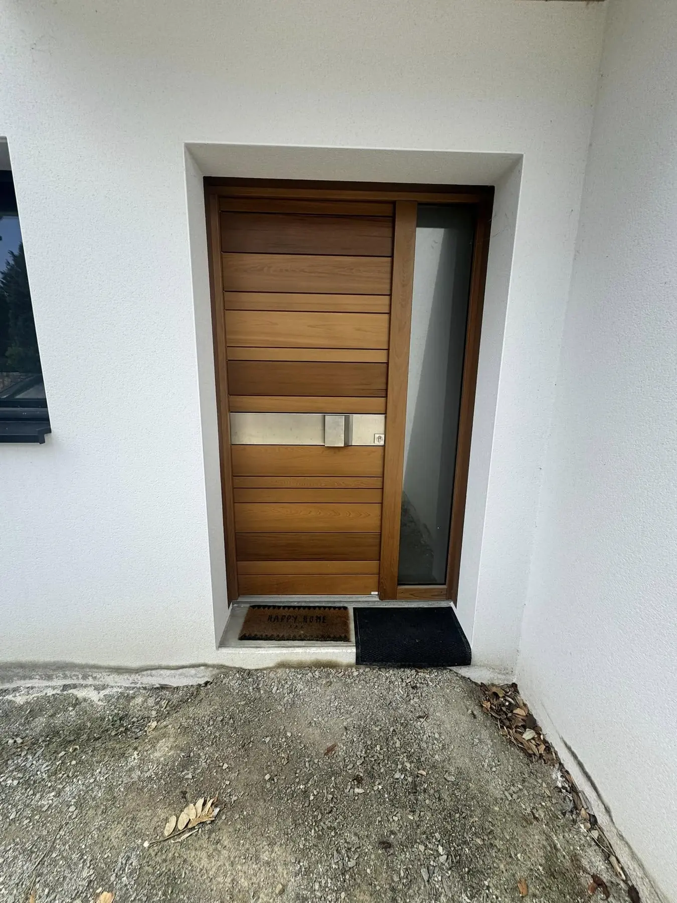 Porte d'entrée bois et vitrage latéral